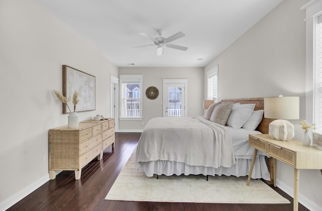 bedroom featuring ceiling fan and dark hardwood / wood-style flooring