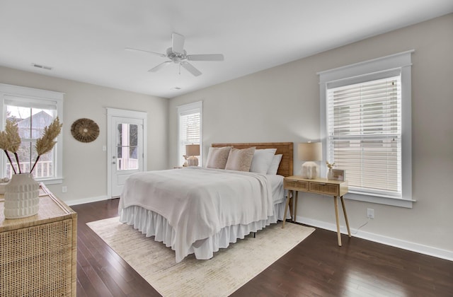 bedroom featuring ceiling fan and dark hardwood / wood-style floors