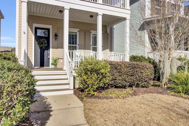 property entrance featuring a porch