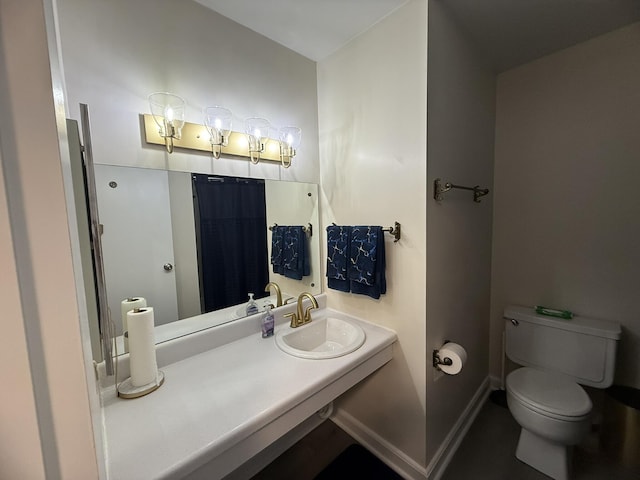 full bathroom with toilet and a sink