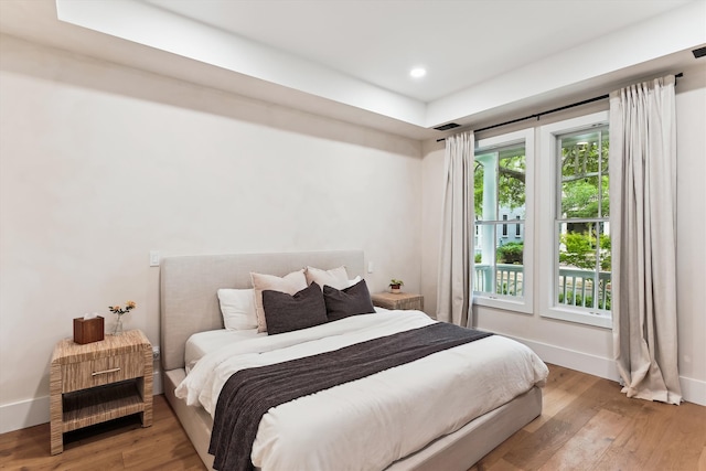 1474 Blue Cascade Dr, Mount Pleasant, SC 29464 - bedroom with light wood-type flooring, baseboards, and recessed lighting