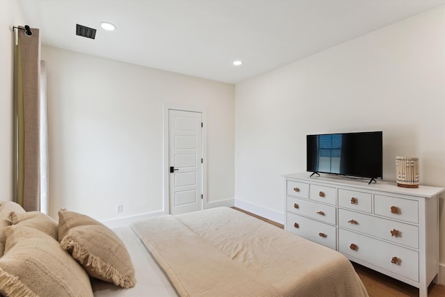 1474 Blue Cascade Dr, Mount Pleasant, SC 29464 - bedroom with baseboards, recessed lighting, and wood finished floors
