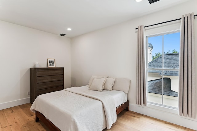 1474 Blue Cascade Dr, Mount Pleasant, SC 29464 - bedroom featuring light wood-type flooring, recessed lighting, and baseboards