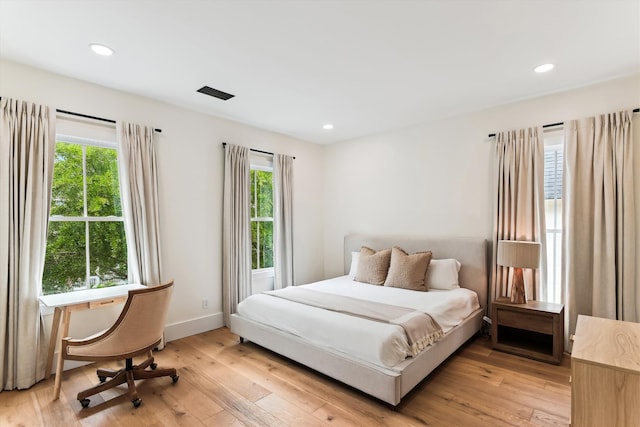 1474 Blue Cascade Dr, Mount Pleasant, SC 29464 - bedroom featuring light wood finished floors, recessed lighting, and baseboards