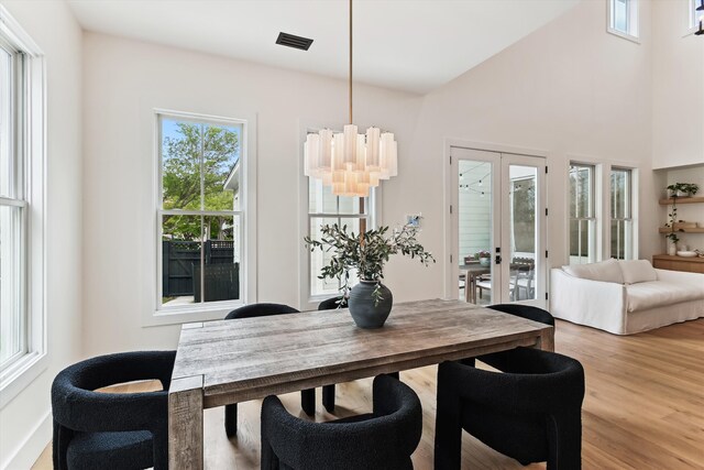 1474 Blue Cascade Dr, Mount Pleasant, SC 29464 - dining room with healthy amount of natural light and wood finished floors
