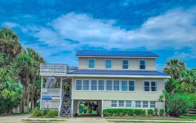 view of front of property with a carport