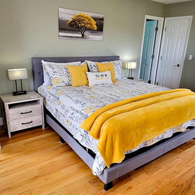 bedroom featuring light wood-type flooring