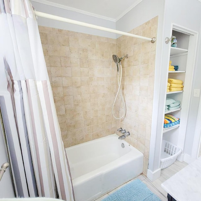 bathroom featuring shower / bath combo, ornamental molding, and vanity