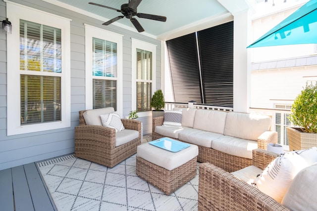 exterior space with wooden walls and ceiling fan