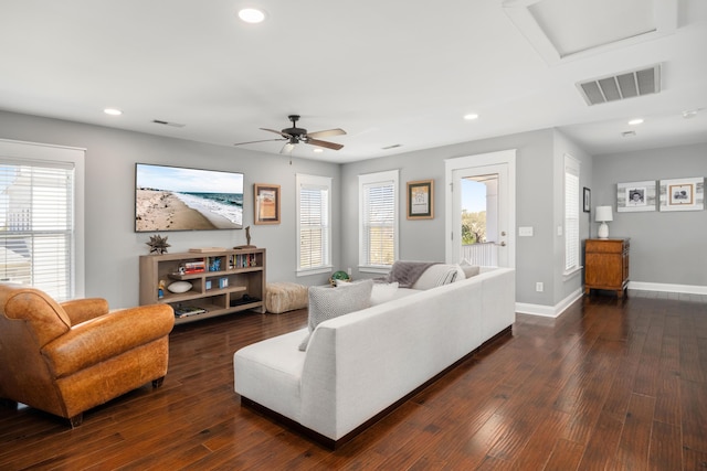 living room featuring recessed lighting, visible vents, a ceiling fan, and baseboards