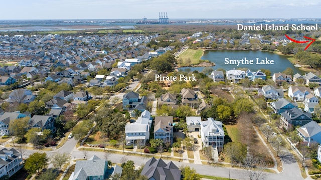 bird's eye view featuring a residential view and a water view