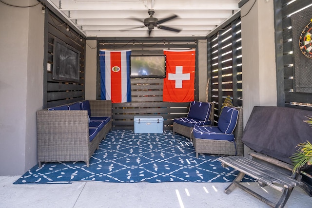 view of patio / terrace featuring ceiling fan