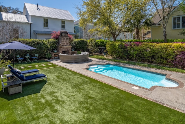 pool featuring a lawn, an outdoor living space with a fireplace, fence, and a patio area