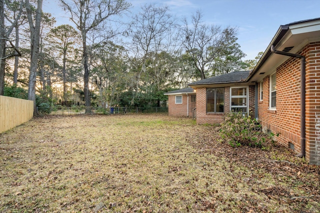 view of yard with fence