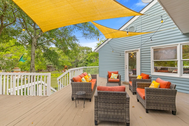 deck with outdoor lounge area