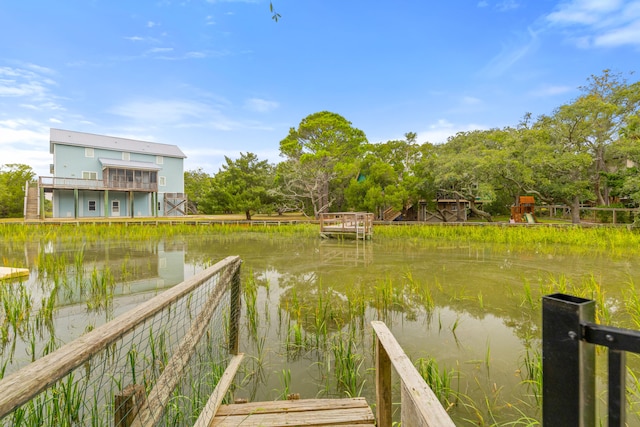 dock area featuring a water view