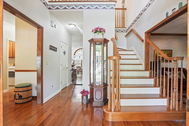 8661 Laurel Grove Ln, North Charleston, SC 29420 - foyer featuring baseboards, wood finished floors, and stairway