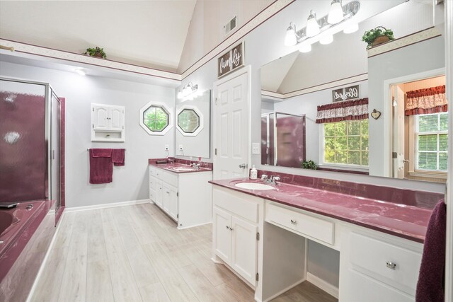8661 Laurel Grove Ln, North Charleston, SC 29420 - bathroom with a sink, a shower stall, vaulted ceiling, and visible vents