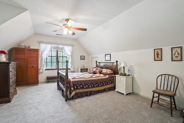 8661 Laurel Grove Ln, North Charleston, SC 29420 - bedroom featuring carpet, vaulted ceiling, a textured ceiling, and visible vents