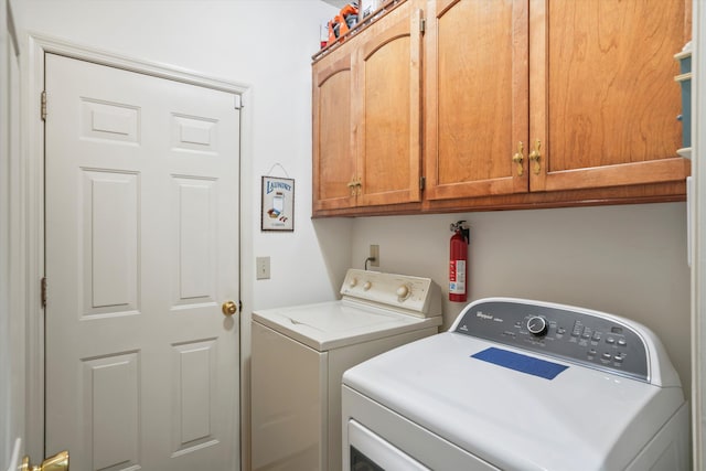 8661 Laurel Grove Ln, North Charleston, SC 29420 - clothes washing area with cabinet space and washer and dryer