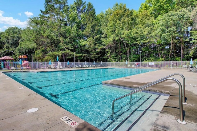 8661 Laurel Grove Ln, North Charleston, SC 29420 - community pool featuring a patio and fence