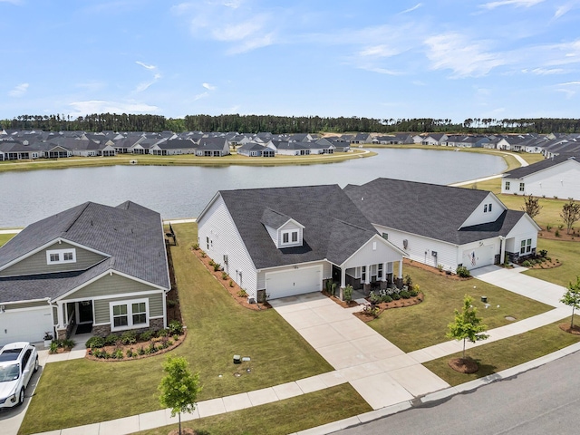 aerial perspective of suburban area with a large body of water