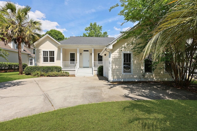 1150 Quick Rabbit Loop, Charleston, SC 29414 - ranch-style home featuring a porch and a front yard