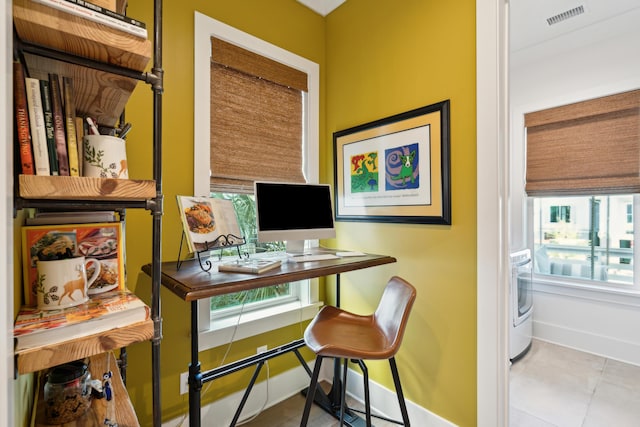 home office featuring light tile patterned flooring