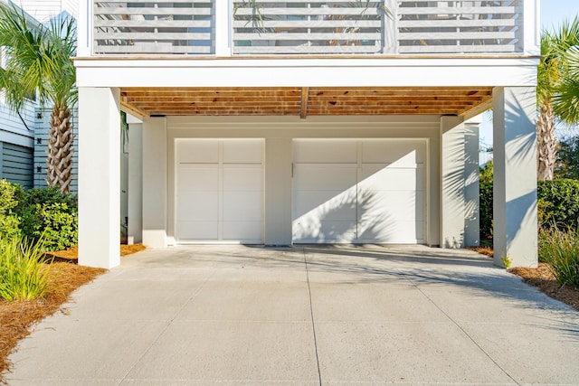 garage featuring a carport