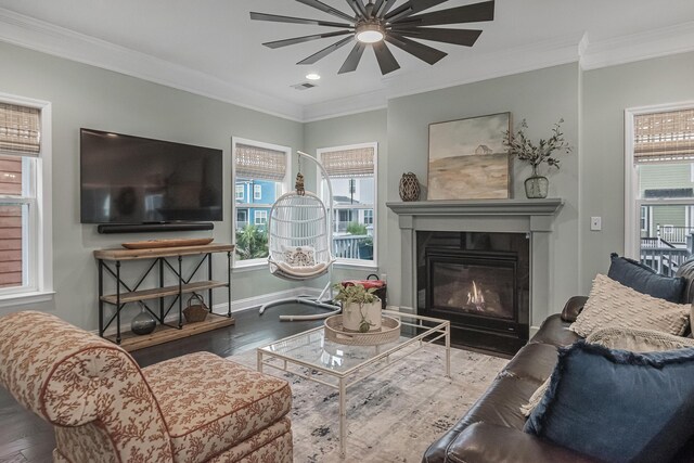 307 Morning Marsh Ln, Charleston, SC 29492 - living room featuring wood finished floors, crown molding, a ceiling fan, a glass covered fireplace, and recessed lighting