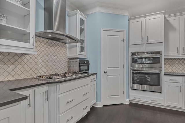 307 Morning Marsh Ln, Charleston, SC 29492 - kitchen with wall chimney range hood, appliances with stainless steel finishes, dark countertops, tasteful backsplash, and white cabinetry