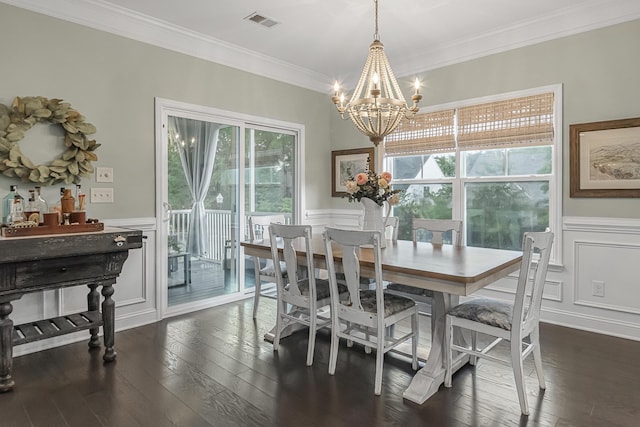 307 Morning Marsh Ln, Charleston, SC 29492 - dining space with a chandelier, ornamental molding, a decorative wall, healthy amount of natural light, and dark wood-style flooring