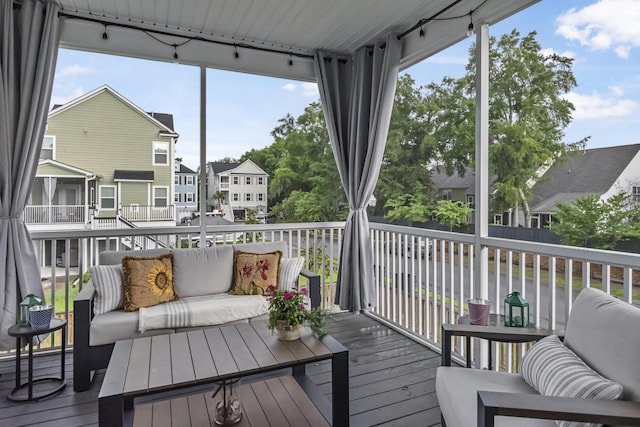 307 Morning Marsh Ln, Charleston, SC 29492 - sunroom / solarium featuring an outdoor living space, track lighting, and a residential view
