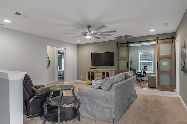 307 Morning Marsh Ln, Charleston, SC 29492 - living room with a barn door, ceiling fan, recessed lighting, and light carpet