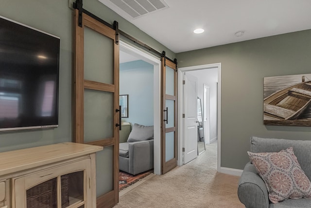 307 Morning Marsh Ln, Charleston, SC 29492 - hallway featuring a barn door, light colored carpet, and recessed lighting