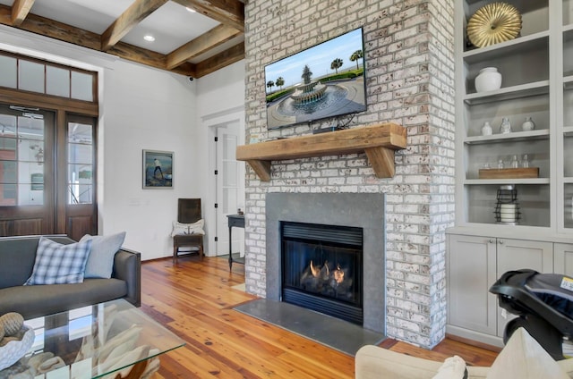 307 Morning Marsh Ln, Charleston, SC 29492 - living room with wood finished floors, a fireplace, beam ceiling, and built in features