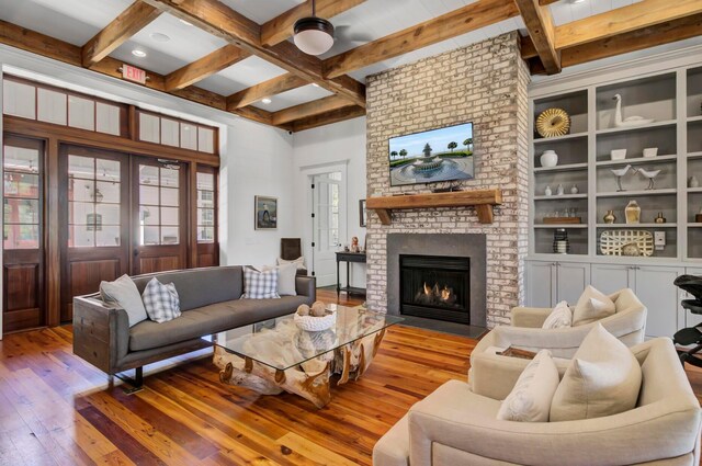 307 Morning Marsh Ln, Charleston, SC 29492 - living area featuring hardwood / wood-style flooring, beam ceiling, a brick fireplace, and coffered ceiling