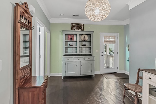 307 Morning Marsh Ln, Charleston, SC 29492 - entryway with ornamental molding, a chandelier, and dark wood-style floors