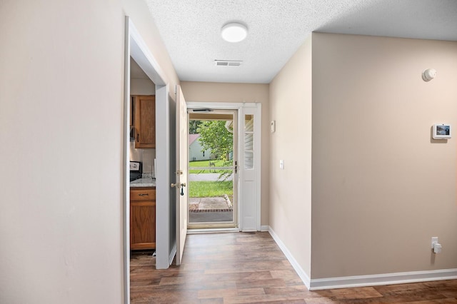 303 Hamlet Rd, Summerville, SC 29485 - entryway with hardwood / wood-style floors and a textured ceiling