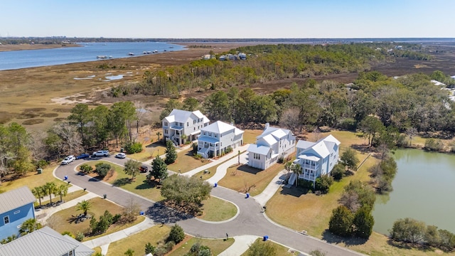 bird's eye view with a water view