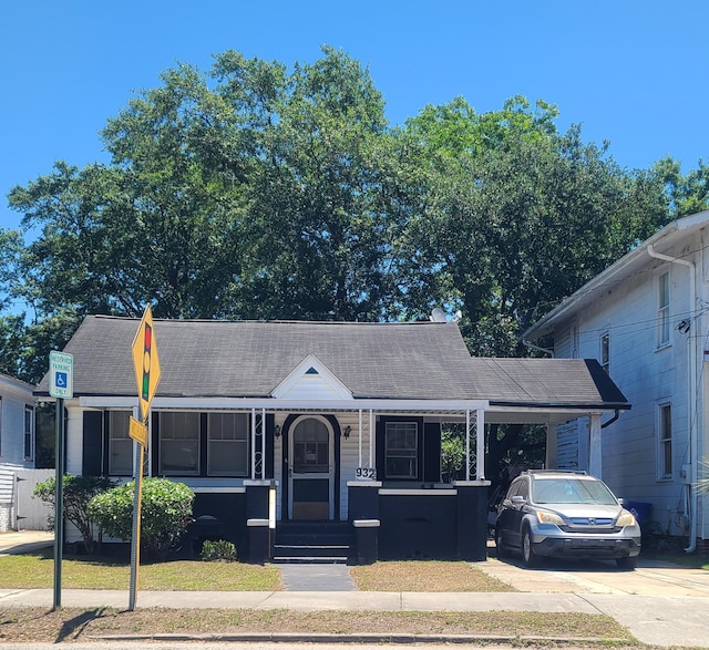 932 Rutledge Ave, Charleston, SC 29403 - view of front facade with a shingled roof and covered porch