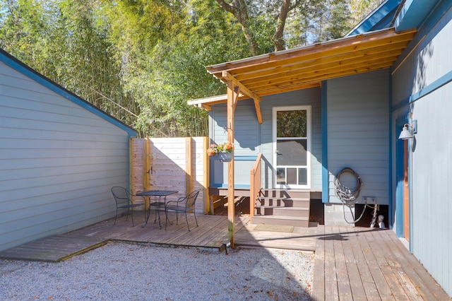 wooden deck featuring fence and entry steps