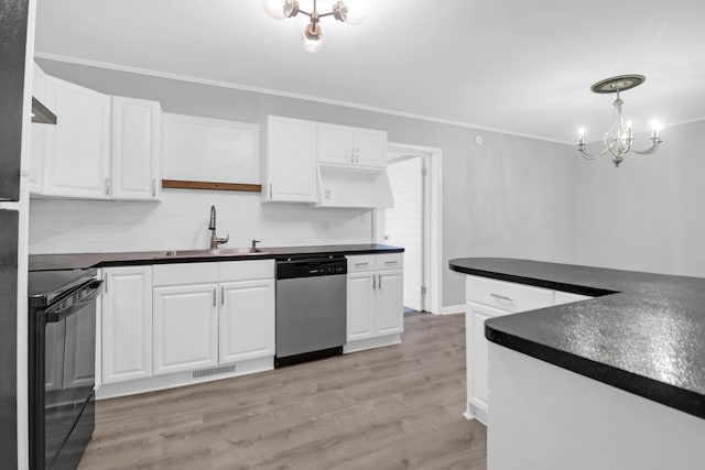 kitchen with electric range, a sink, stainless steel dishwasher, dark countertops, and white cabinets