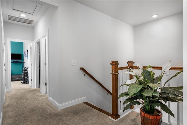 stairs featuring visible vents, baseboards, carpet, attic access, and recessed lighting