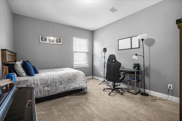 bedroom featuring carpet, visible vents, and baseboards