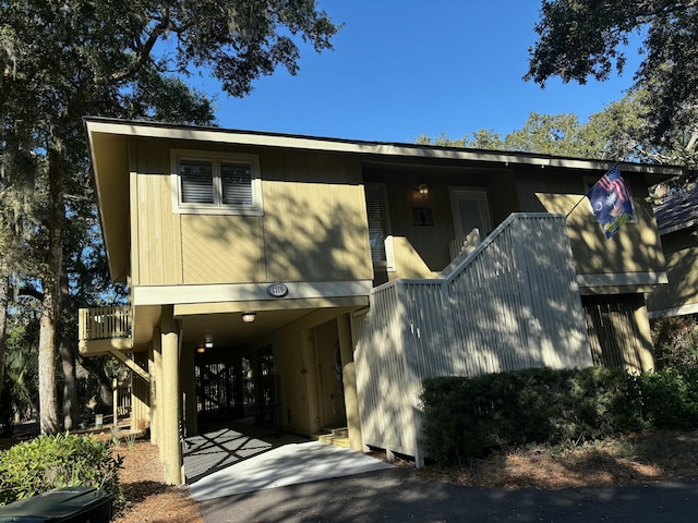 view of front of property with a carport