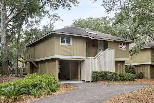 view of front of home with a carport