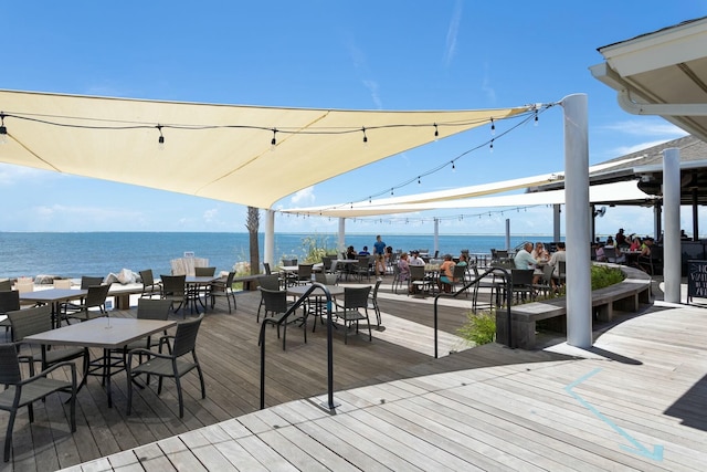 wooden terrace with a water view