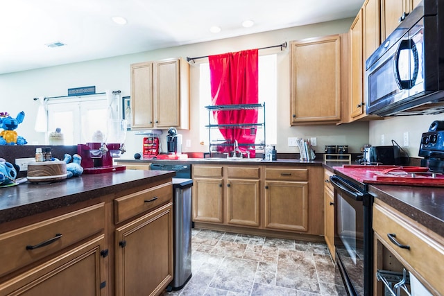 kitchen with visible vents, black range with electric stovetop, a sink, dark countertops, and recessed lighting