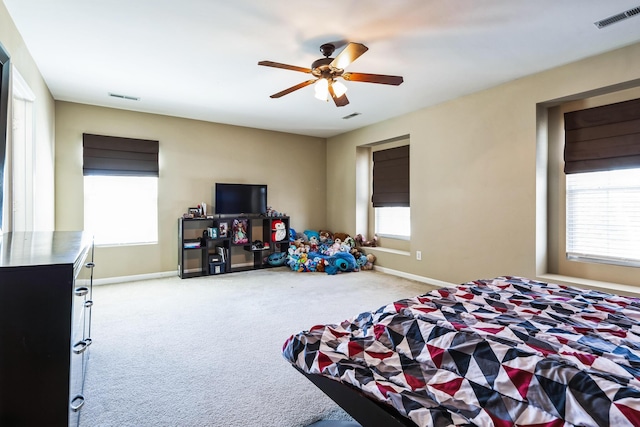 bedroom featuring carpet, visible vents, and baseboards